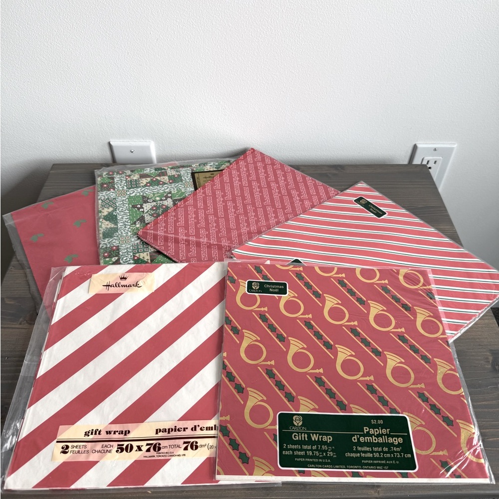 6 packs of vintage Christmas wrapping paper 
Carlton & Hallmark